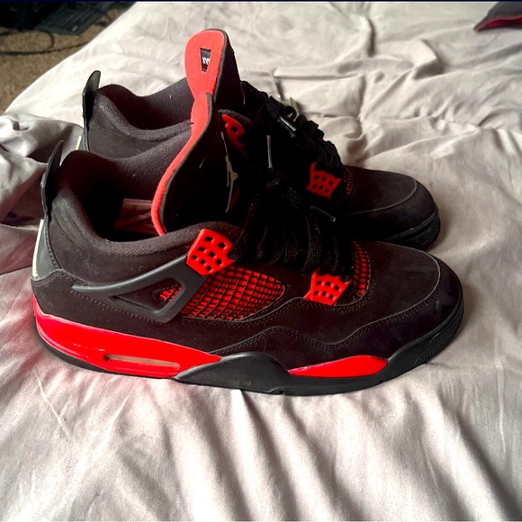 Black and red jordan 4s